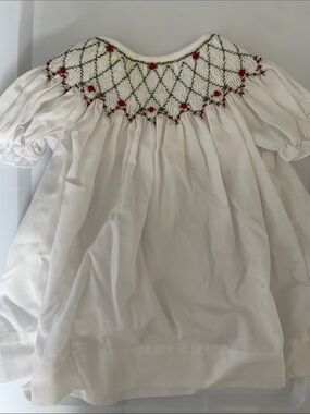 Classic White Smocked Girls' Formal Dress with Red Floral Detail